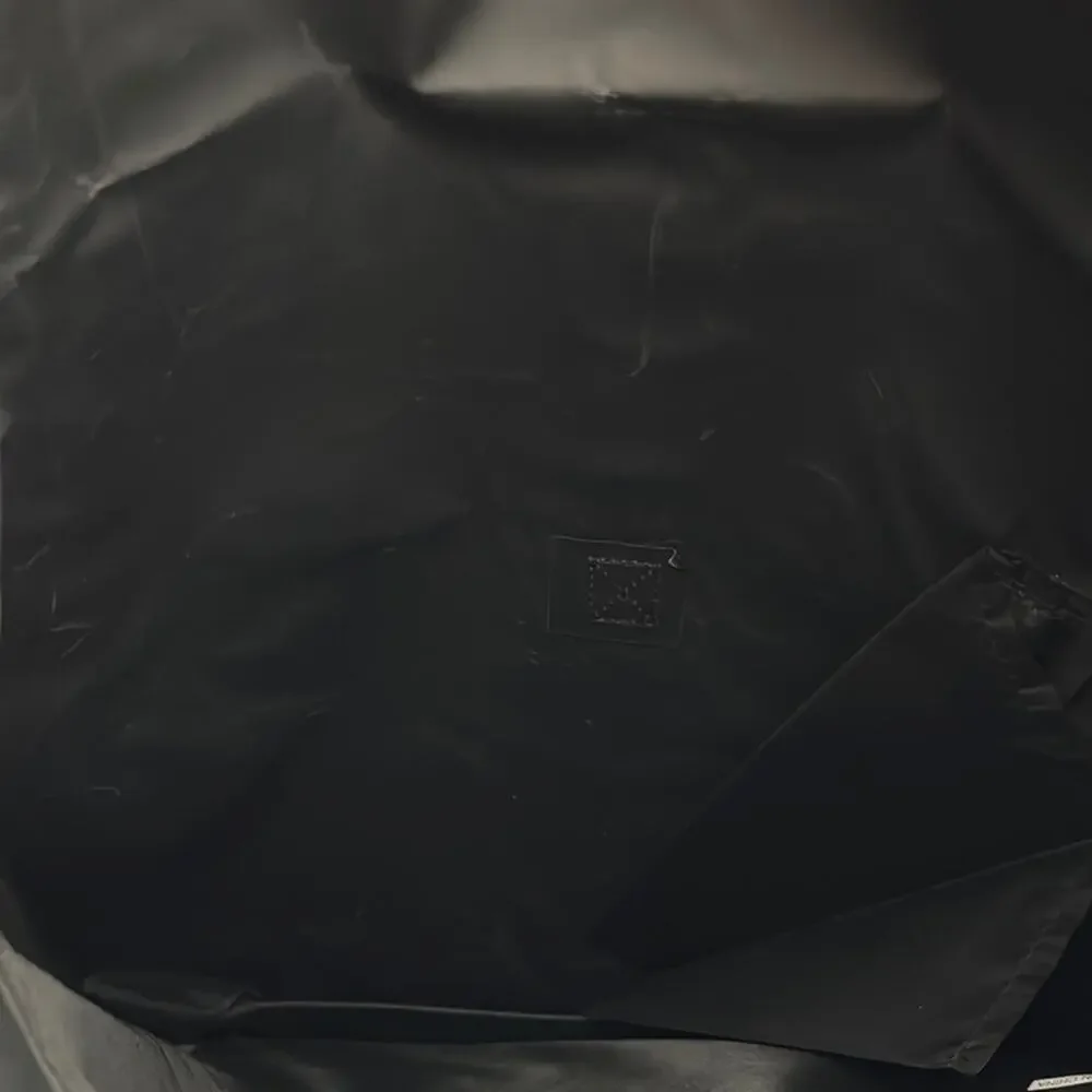 Paco Rabanne Camouflage Backpack with Modern Design gift with purchase item.